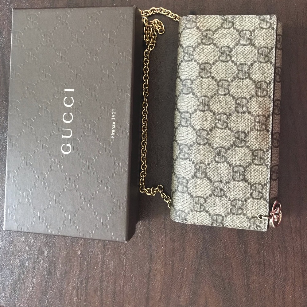 Gucci brown leather clutch